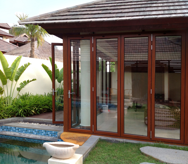 Modern Interior Bi-fold Barn Door with Glass