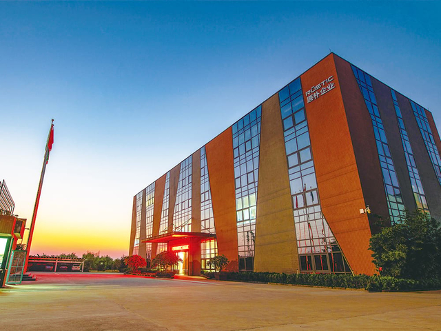 Corporate building exterior at sunset